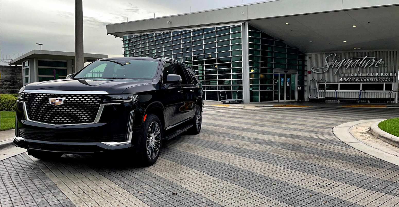 Black Cadillac Escalade at Signature Flight Support private aviation terminal